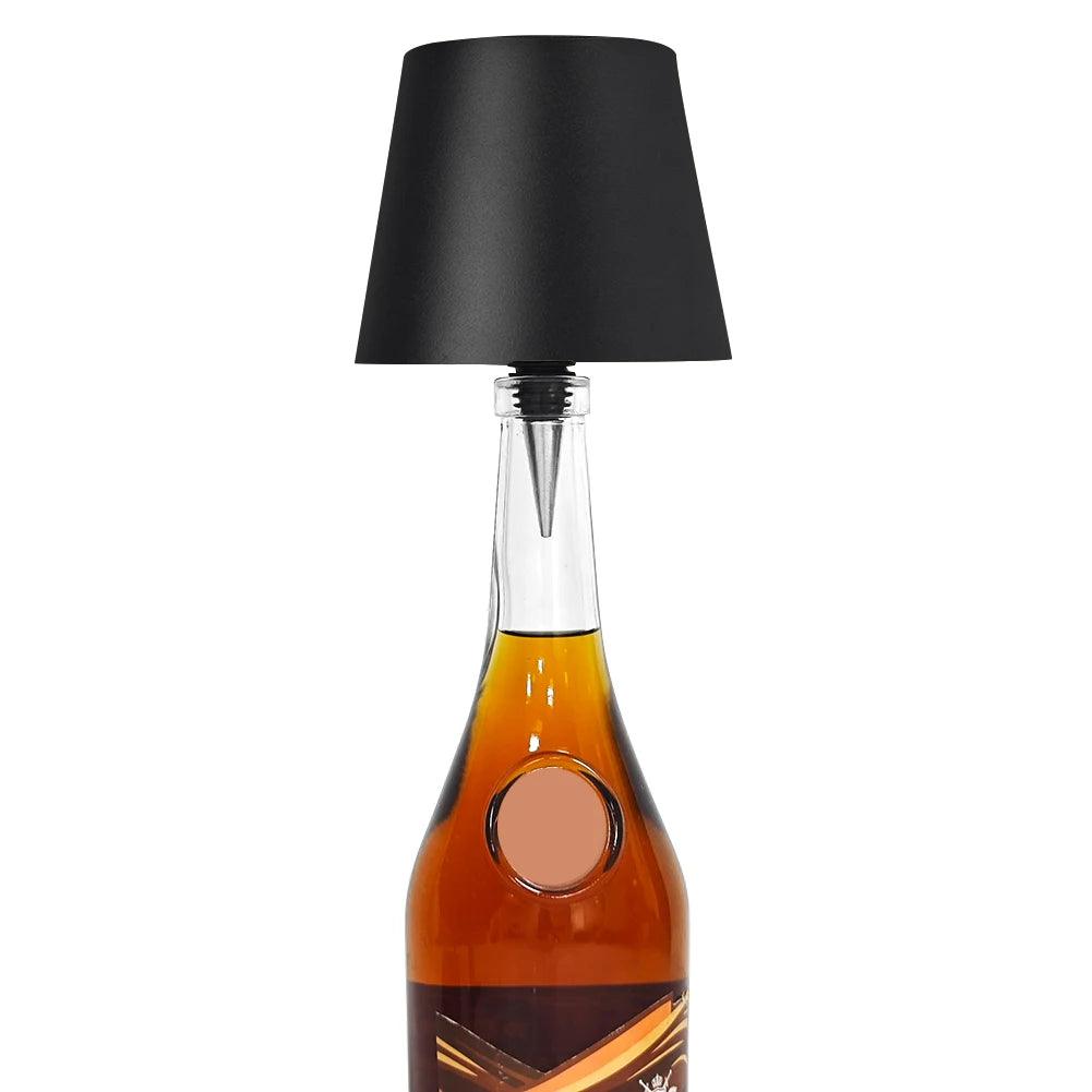 Modern LED bottle lamp on white background, stylish home decor